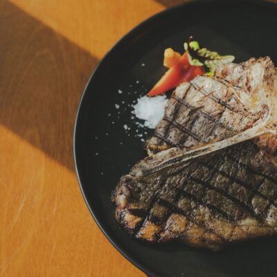grilled meat on black plate